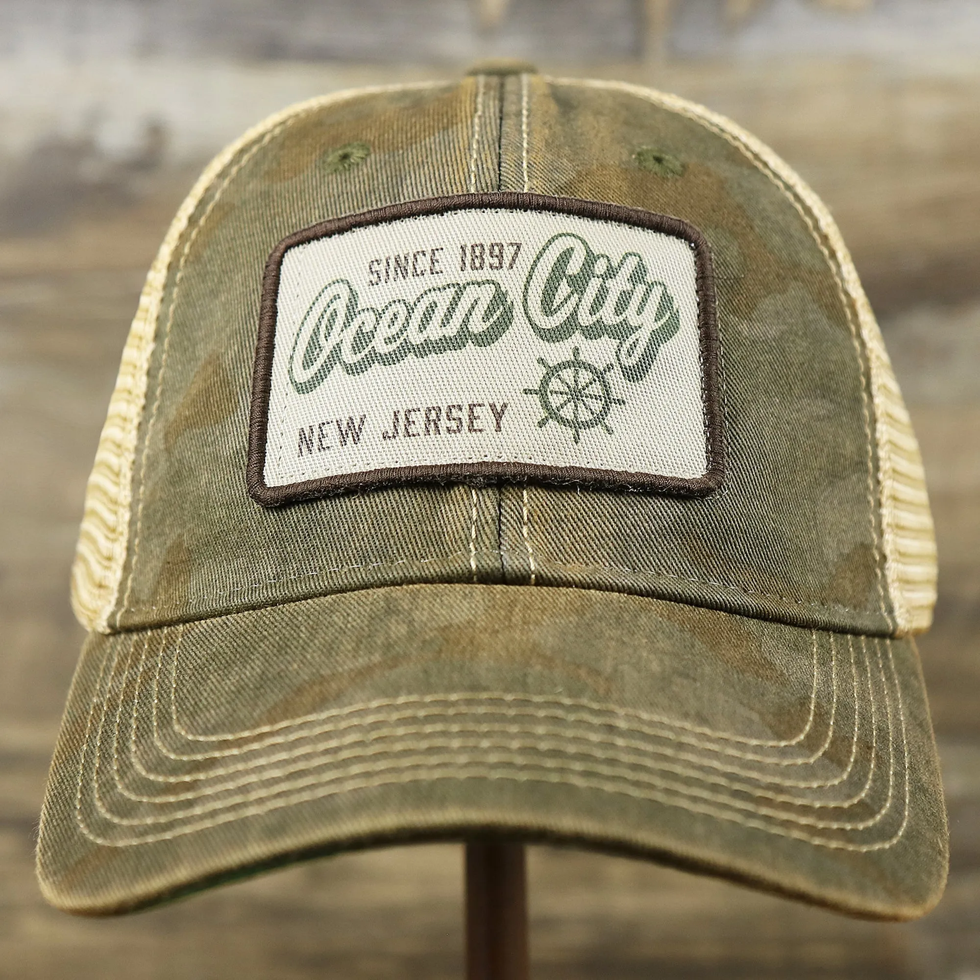 Ocean City New Jersey Since 1897 Helm Patch Camo Print Mesh Back Trucker Hat | Camo Green Trucker Hat