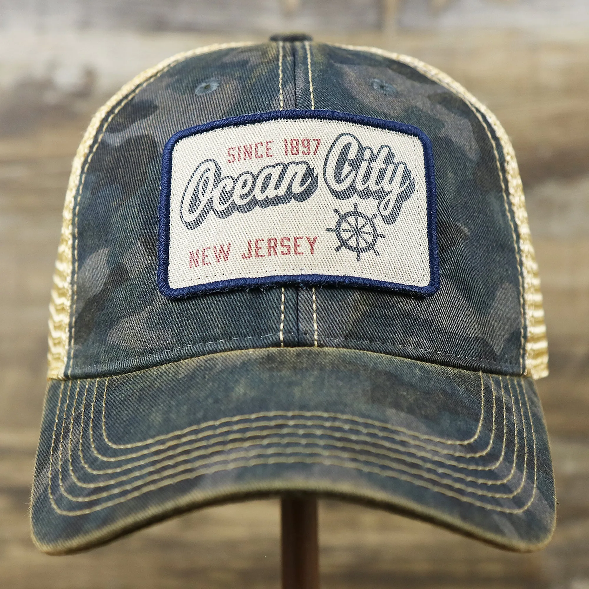 Ocean City New Jersey Since 1897 Helm Patch Camo Print Mesh Back Trucker Hat | Camo Navy Blue Trucker Hat